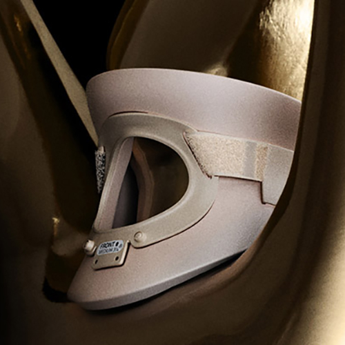 High-end CGI healthcare advertising render featuring an award statue wearing a 3D medical neck brace