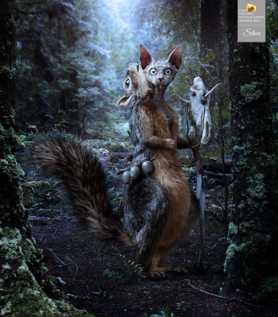 LorettFoth_THU_Cat 2 copy Award-winning 3D Sphynx cat shaman concept wearing a squirrel pelt in a fantasy forest for THU
