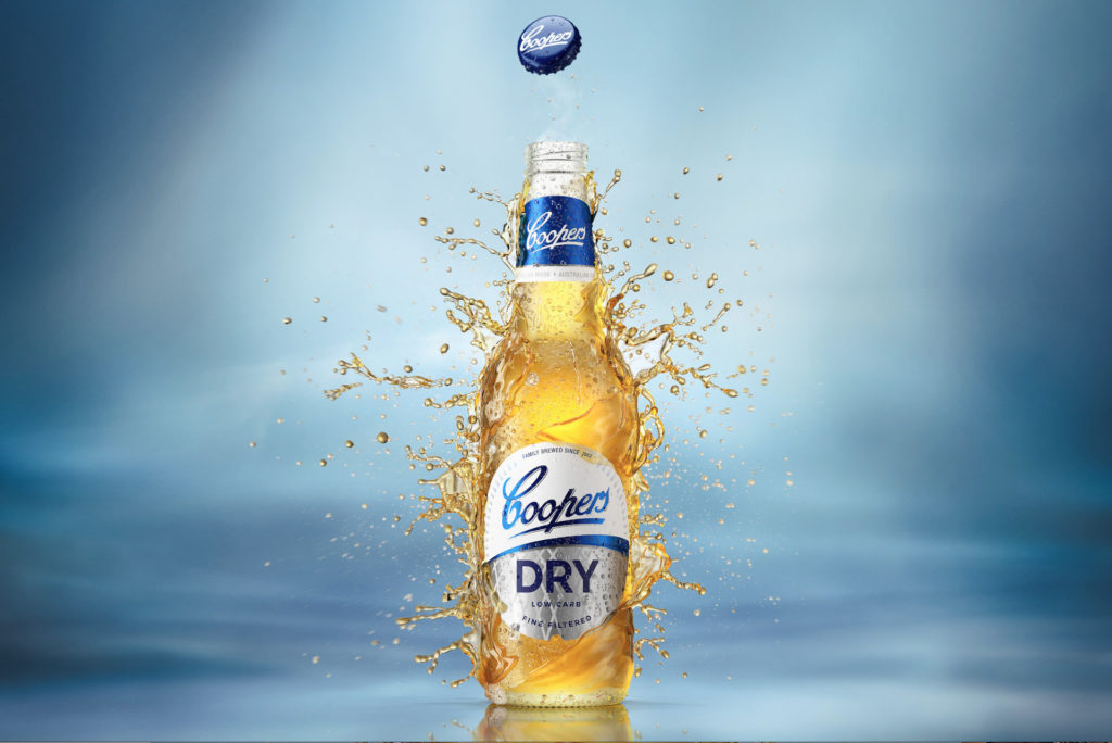 High-end CGI Coopers bottle render with dynamic liquid splash