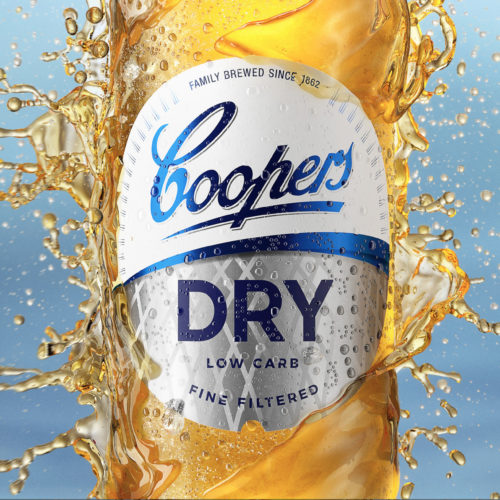 High-end CGI Coopers bottle render with dynamic liquid splash closeup